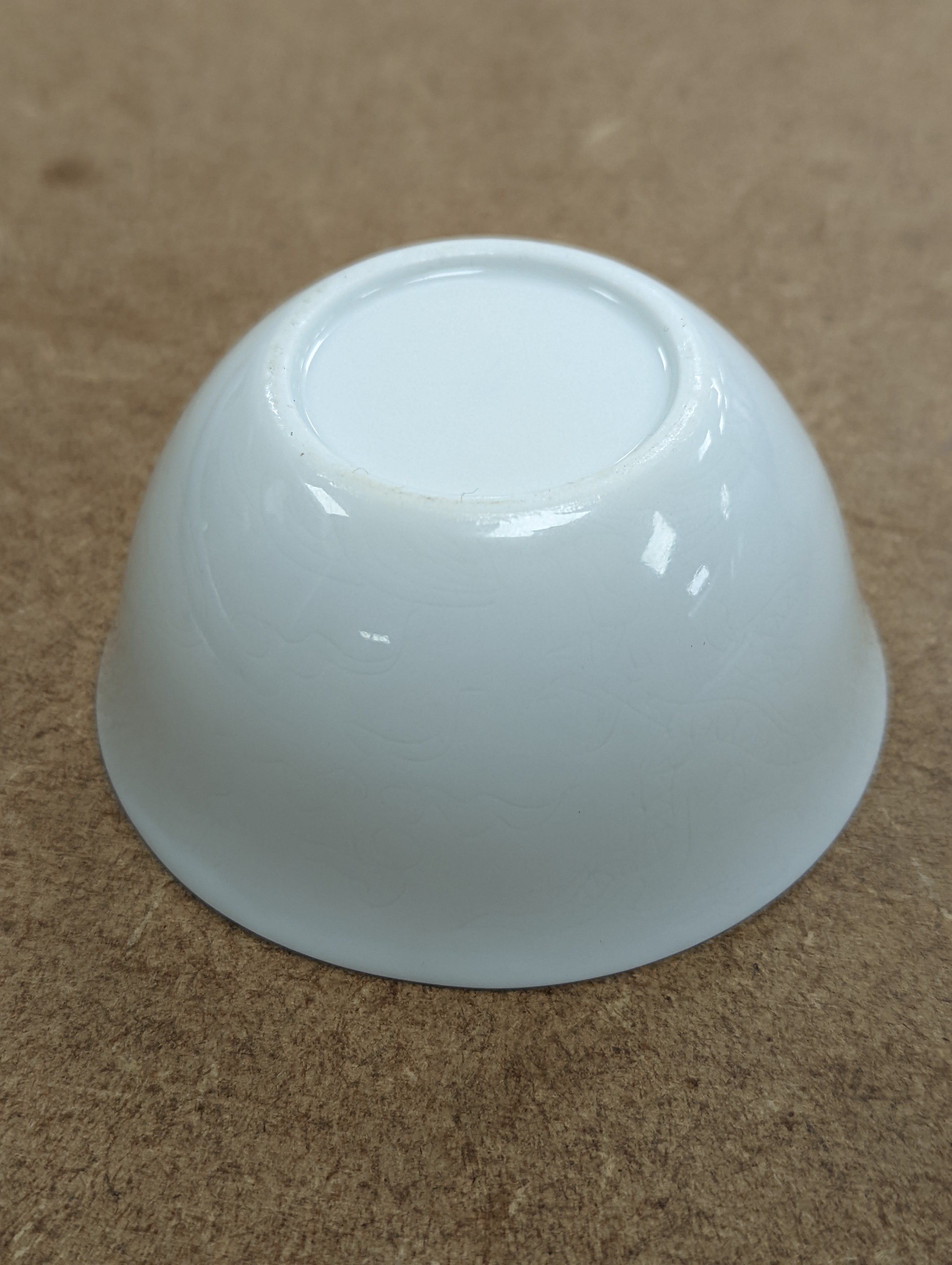 A Chinese white glazed water pot and a similar cup (2)